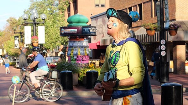 EARTH MAN can be found all over Boulder, but here you can see he's playing in the heart of Pearl Street.