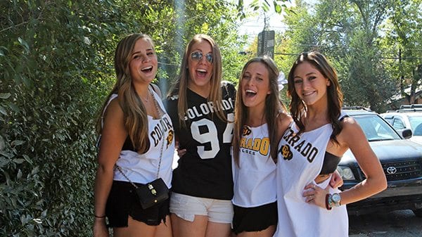 A group of CU student Buffs roam the hill in search of a pre-game party. (Photo Credit Joseph Wirth)