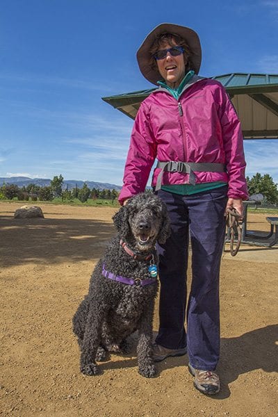 Mary Ann Wilner and her poodle Kofi hang out at the East boulder Community Center on a bluebird afternoon. (Photo: Joseph Wirth)