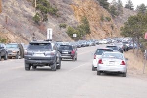 Traffic and parked cars on Canyon Blvd in Nederland