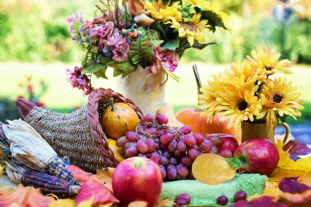 Flowers and Fruits on a Table