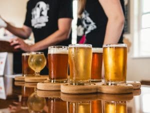 clear drinking glass with beer