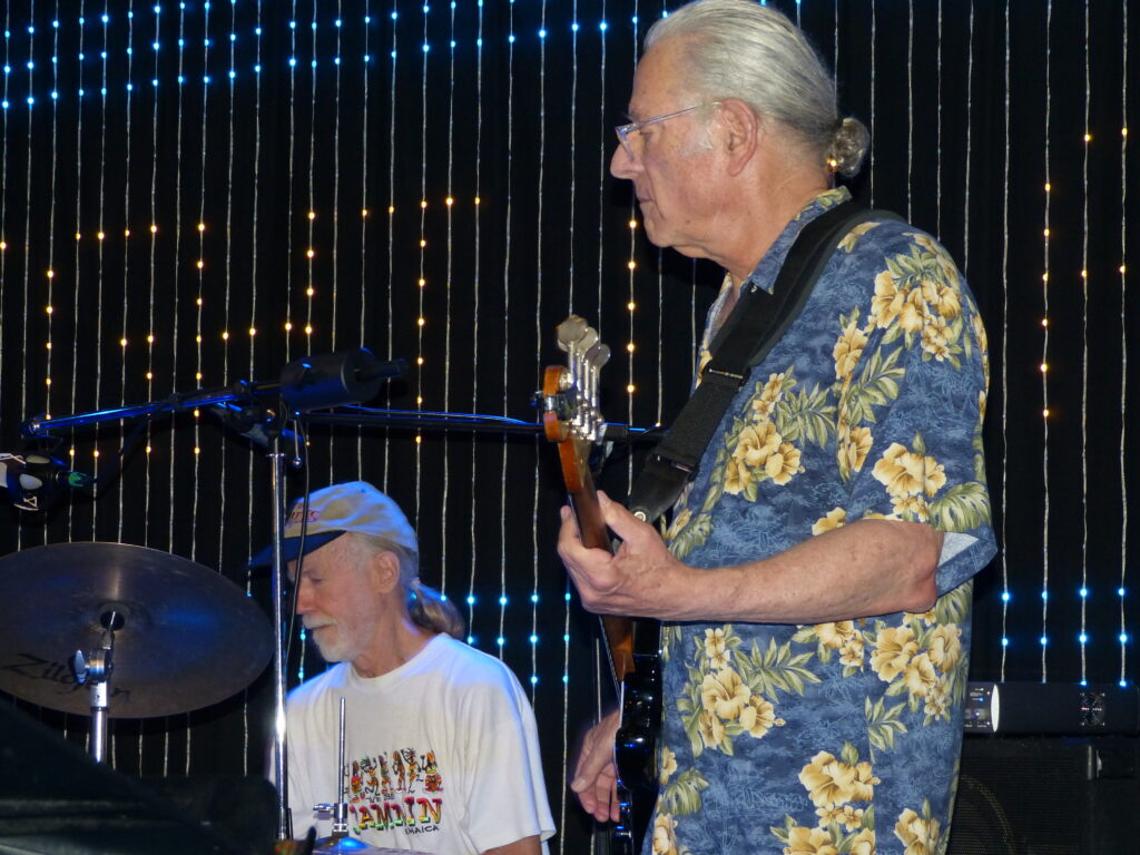 Tom Lilenthal on bass and Bill Brennan on drums rock