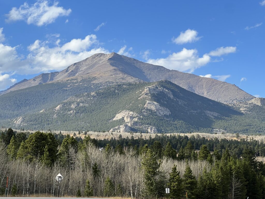 Longs Peak in Rocky Mountain National Park before snowfall. Elk in lower fields and higher up are common