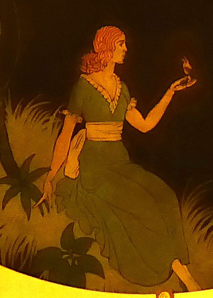 A detail from one of the art deco murals at the Paramount Theater showing a woman holding a bird at the Jorma 85th Birthday performance