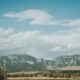 Beautiful landscape of the Flatirons in Boulder, Colorado under a blue sky.