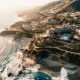 aerial photography of buildings near body of water